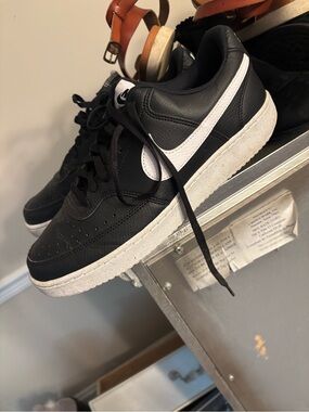 Nike Black Low-Top Sneakers with White Swoosh